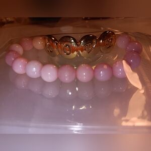 Pink and Gold Beaded Bracelet With The Word Love